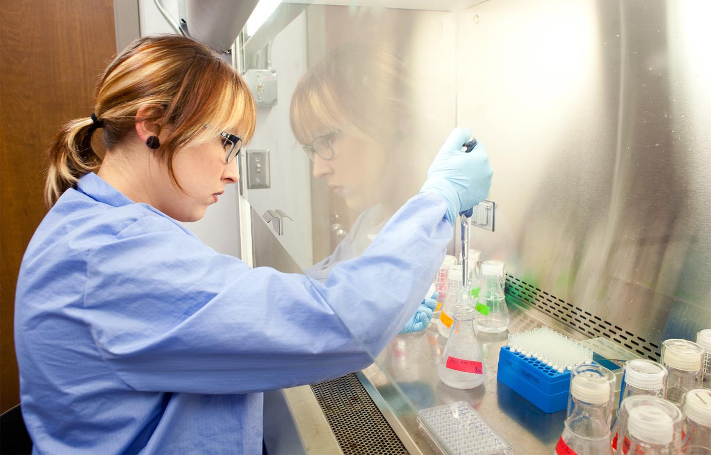 Scientist working with samples in lab