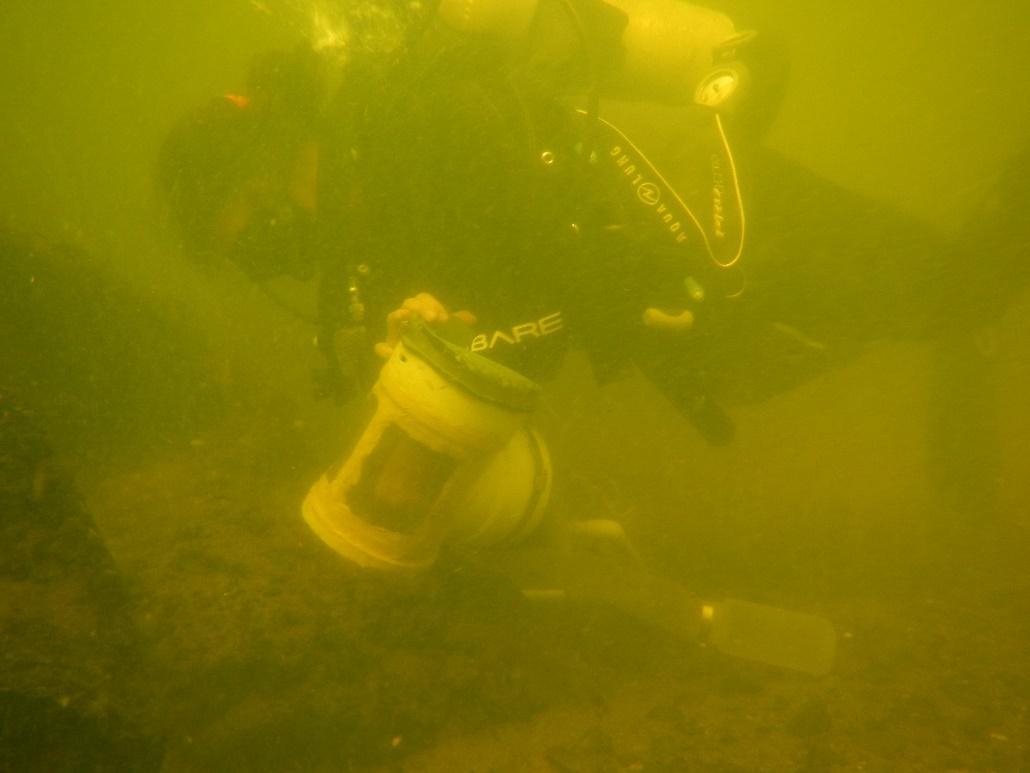 Diver collecting underwater sample
